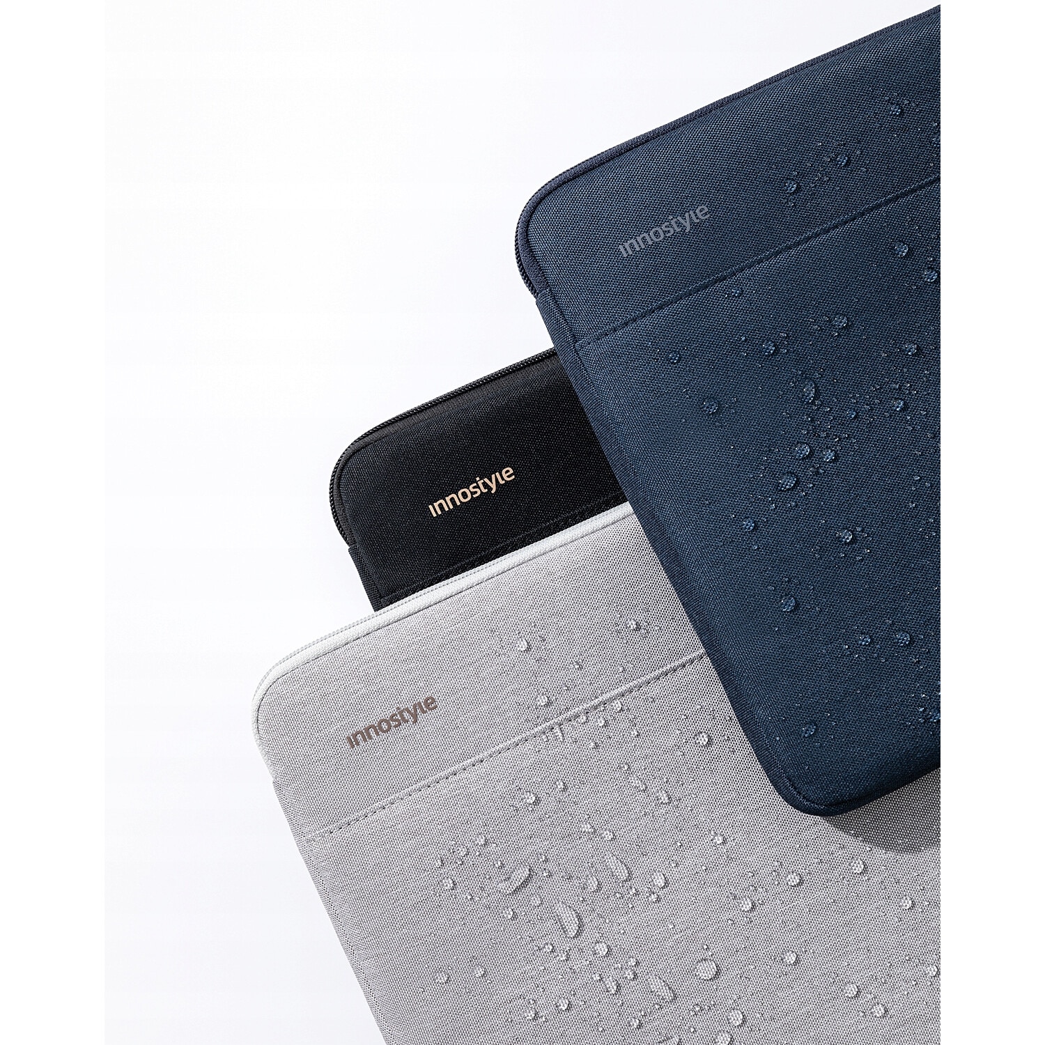 Geanta laptop Innostyle OmniProtect® Slim, pentru laptopuri de pana la 13", impermeabila, colturi ranforsate ArmoredEdge, fermoare YKK, compartiment captusit, negru