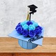 Aranjament toca absolvire - cu topper, decorat cu flori de sapun albastru-albastru intens, din lemn, 22x22x17 cm, cutie albastra