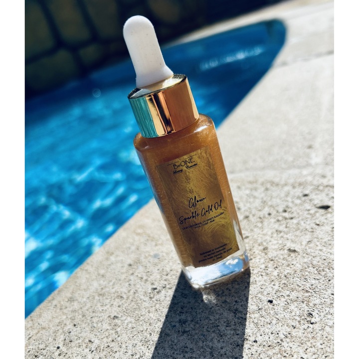 Ulei universal Glow Sparkle Gold Oil cu efect radiant pentru corp, fata si par, 30 ml, auriu, particule mari de sclipici