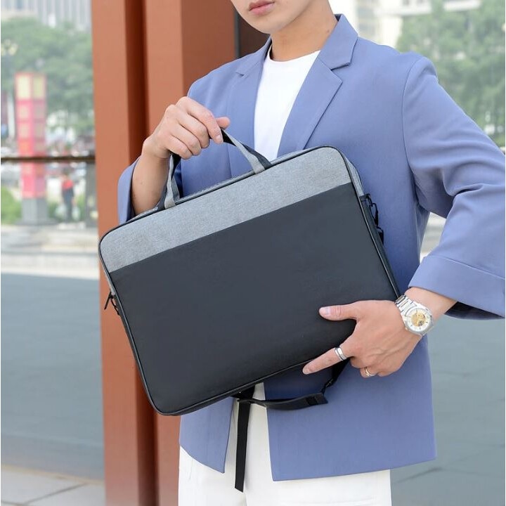 Geanta Laptop, Bicolora, Compatibila 15.6", 3 Buzunare, Textil, Extensie umar, Negru si Gri