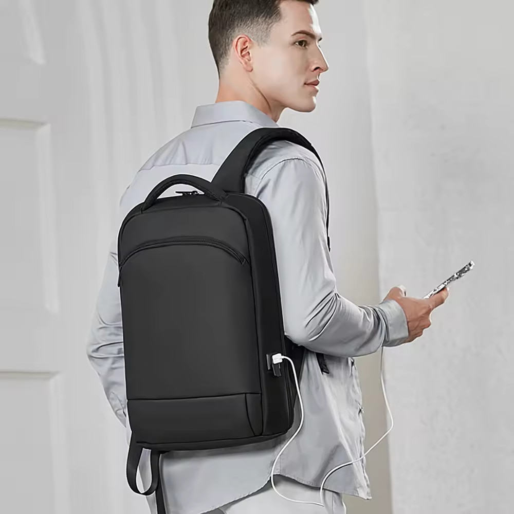 Rucsac laptop 15.6" business casual ingust, impermeabil, cu port de incarcare USB si buzunar antifurt, GETICS, 28.5x8x42 cm, Negru