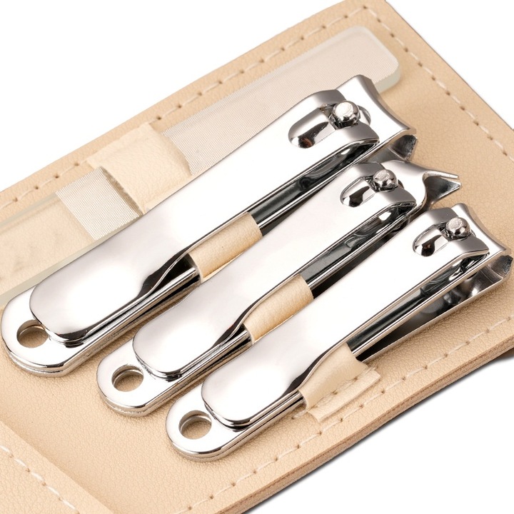 Set manichiura si pedichiura, 4 piese, argintiu, cu husa din piele