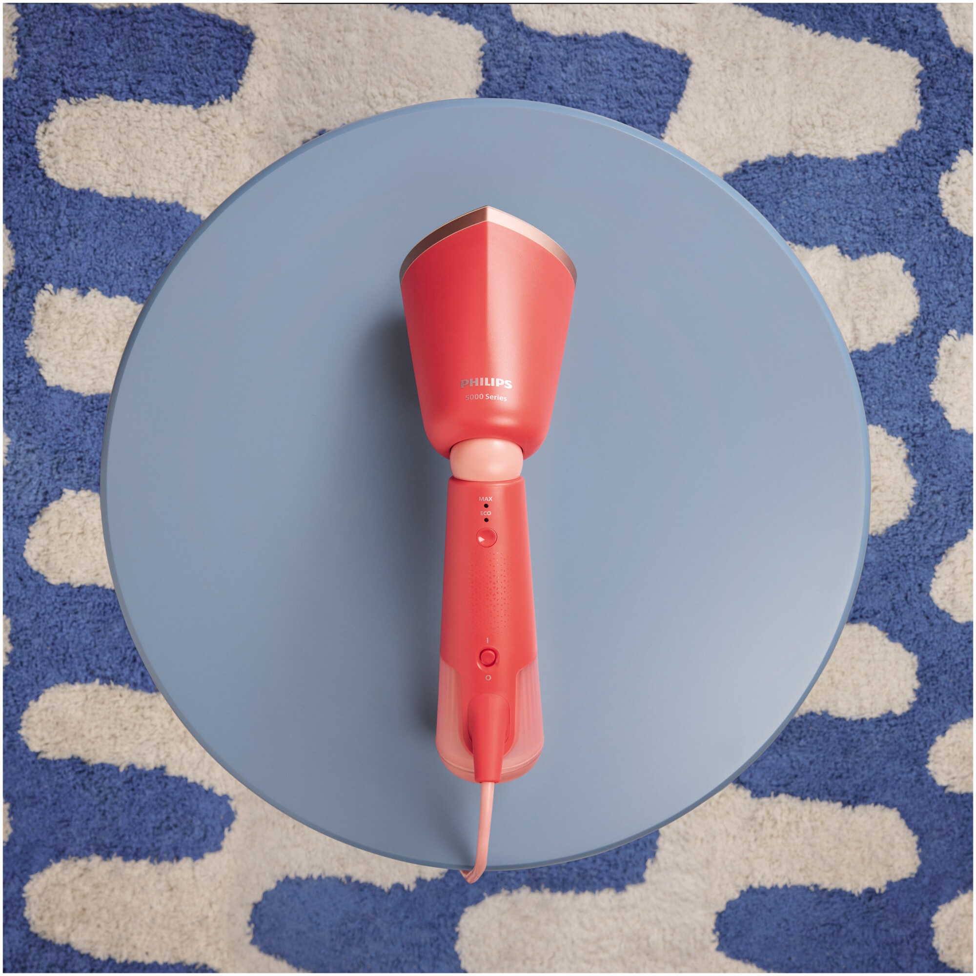 Aparat de calcat vertical portabil Philips STH5020/40 Seria 5000, 1300W, debit de abur 24 g/min, rezervor de apa 120 ml, talpa metalica, cap reglabil pentru calcare verticala si orizontala, saculet dezozitare/ manusa (2in1), culoare: corai