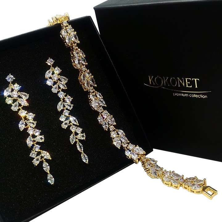 Set de cercei si bratara cu frunze de aur garantie de nunta eleganta