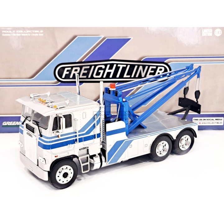 Macheta Camion Freightliner FLA 9664 Tow Truck 1984 argintiu/albastru cu vitrina plexiglass - 1/43 Greenlight