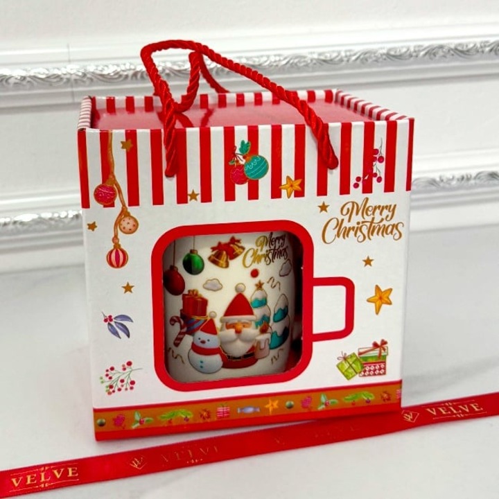 Set cana din ceramica si lingurita, cu tematica de Craciun, ambalata in punga cadou asortata, cu fereastra, 300ml, Velve