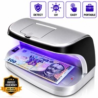 Detector valutar cu UV, Excitat®, cu lumina LED pentru verificare. Dispune de functie automata de pornire/oprire, portabil si usor, reincarcabil, Potrivit pentru valutele din toate tarile, bancnote, cecuri, pasapoarte si carduri de credit, gri