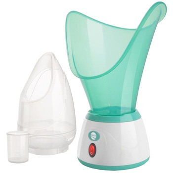 Sauna faciala Daga SF 180, 85 W, Buton pornit/oprit, ajustare debit abur, masca pentru inhalare nas si pahar de masura, Alb/Verde Sauna faciala Daga SF 180, 85 W, Buton pornit/oprit, ajustare debit abur, masca pentru inhalare nas si pahar de masura, Alb/Verde