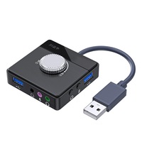 Placa de sunet externa transmisie live, JENUOS®, Plug and play, 6 in 1, USB2.0*3 + Tip-C + port audio + port pentru casti + port pentru microfon + mutare audio + mutare microfon + reglare volum, Negru