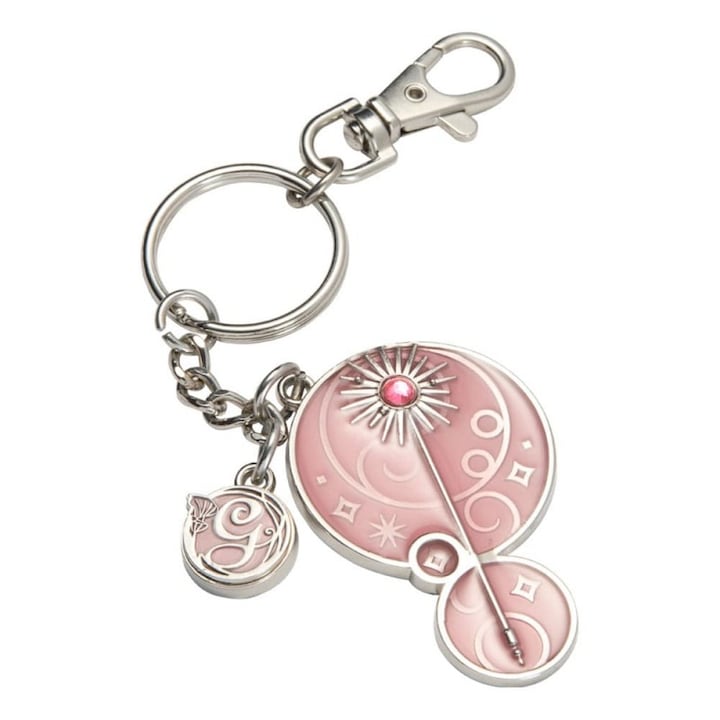 Breloc metalic Glinda, Noble collection, argintiu, cu charm roz "G"