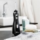 Irigator bucal Waterpik Profesional WP-582, portabil, 4 capete curatare, 3 trepte presiune, incarcare USB magnetica, negru