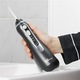 Irigator bucal Waterpik Profesional WP-582, portabil, 4 capete curatare, 3 trepte presiune, incarcare USB magnetica, negru
