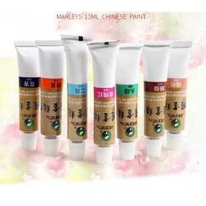 Acuarele, pensule si blocuri de desen