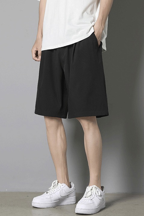 Férfi háromnegyedes rövidnadrág, laza fazon, 6 széles zsebbel, Intenzív fekete