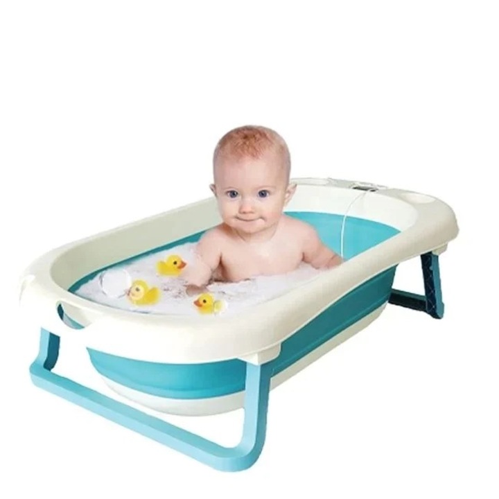 Cada pliabila, Welora, pentru bebelusi, cu termometru digital, dimensiuni 81x45x21.5cm, alb-verde