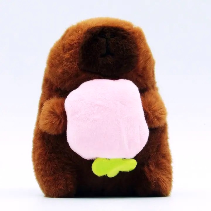 Jucarie Breloc din Plus Tip Capybara, pentru Copii +3 Ani, Lungime 11 cm, Culoare Maro cu Floare Roz ABYZ™, Accesoriu Dragalas si Distractiv