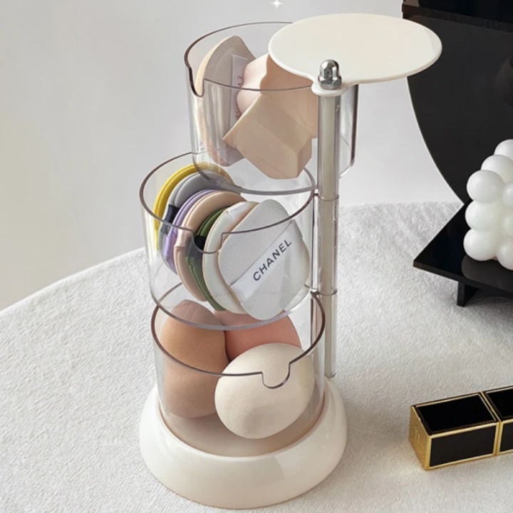 Cutie pentru bijuterii/cosmetice, cu 3 compartimente, dimensiuni 18.5 x 11 cm, compartimentele se rotesc la 360°, cu design modern si usor de intretinut, alb/ transparent