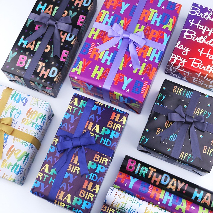 Születésnapi csomagolópapír szett, 6 ív, 6 címke, 2 szalag, többszínű design, 70x50cm