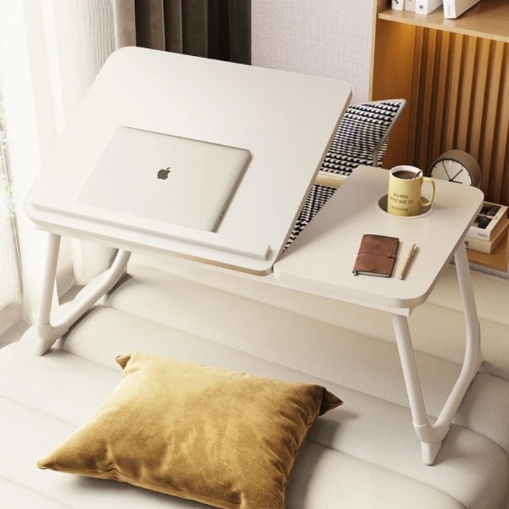 Masa pliabila pentru laptop, cu suport pentru pahar, reglabila pe inaltime 5 pozitii, dimensiuni 55.3 x 24 x 32 cm, greutatea maxima suportata 45 kg, alb