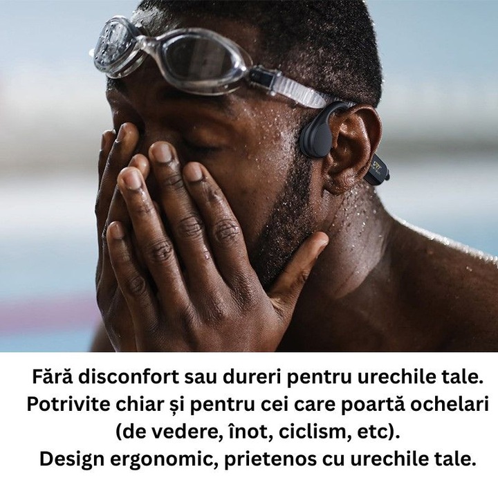 Casti VeReTech pe masa, aproape de un laptop