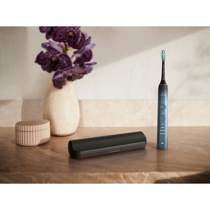 Periuta electrica sonica PHILIPS Sonicare DiamondClean Seria 9000 HX9911/89, 4 moduri de periere, 3 intensitati, senzor de presiune, senzor BrushSync, conectivitate cu aplicatia Sonicare, 1 toc de transport, 4 capete C3, suport de incarcare, Acvamarin