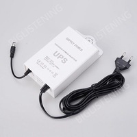 Mini UPS BIGLISTENING® Power Buddy, sursa de alimentare pentru supraveghere rezistenta la ploaie si trasnet 3600 mAh, Alb, 12V-2A, 120x80x35mm, poate fi utilizata ca adaptor de alimentare pentru camere de supraveghere, Alb