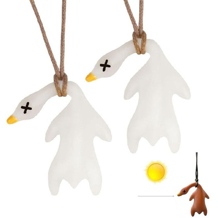 Kreatív kacsa alakú kulcstartó, színváltós dizájn, fehér belül, 'sült kacsa' szín a napon, 6,5x3,5x2,5cm