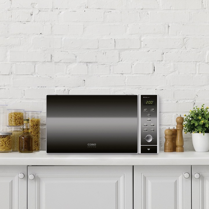 Cuptor cu microunde 3in1 Caso Germany, capacitate 30 litri, convectie comutabila, functie de grill, platou rotativ 31.5 cm, temperatura reglabila max. 200°C, 5 trepte de putere, 9 programe pre-stabilite, functie pre-incalzire, timer 95 min, argintiu