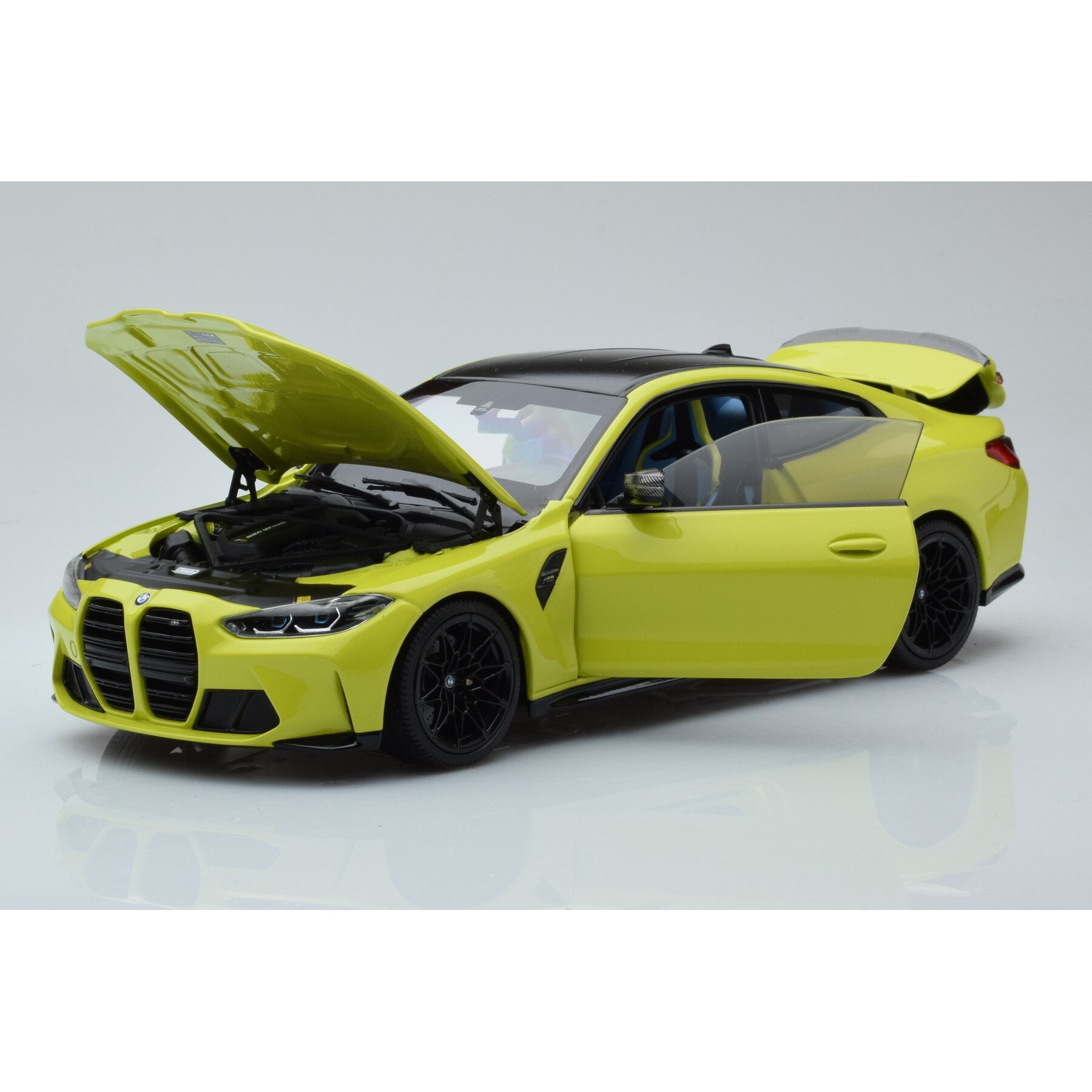 BMW M4 (G82) jaune Sao Paulo (Minichamps) 1/43e