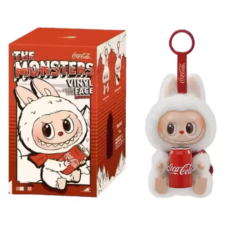 Фигурка ЛаБубу – герой от Happy Factor (бяла), колекция Coca Cola, плюс въртяща се глава, декоративен ключодържател 12 см и колекционерска играчка, мин. възраст 3+ години ANGMAD